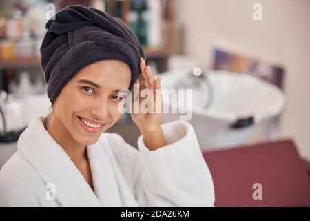 Blurred sink and shelves with the products in the background Stock Photo