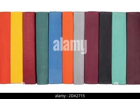 Close up view of colorful old spines vintage books. Isolated on white background. Stock Photo