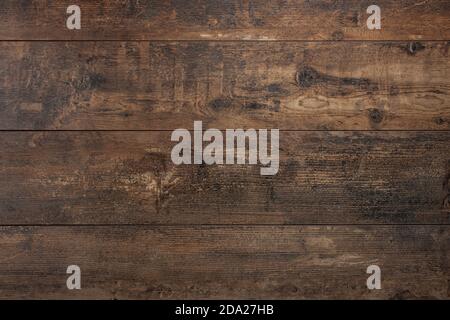 Wooden background. Texture with an old, rustic, brown planks. Old Vintage dark brown wooden table textured background Stock Photo