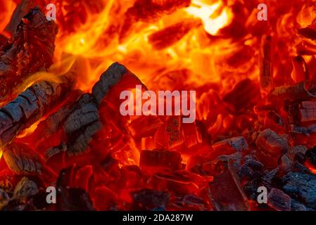 burning charcoal in the background. Burning coal in the dark Stock Photo