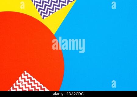 Abstract geometric fashion papers texture background in yellow,red, blue colors. Top view, flat lay Stock Photo