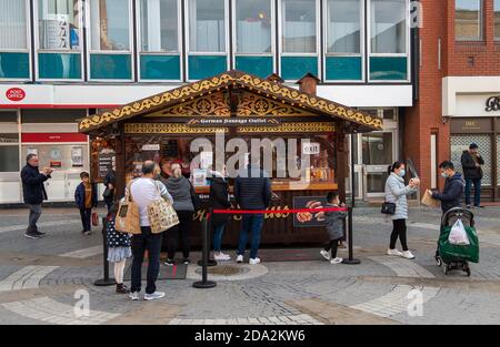 Windsor, Berkshire, UK. 7th November, 2020. A pop up German sausage food kiosk. Windsor was much busier today on the third day of the new Covid-19 Coronavirus lockdown. A lot more shops and cafes were open than during the first lockdown. Credit: Maureen McLean/Alamy Stock Photo