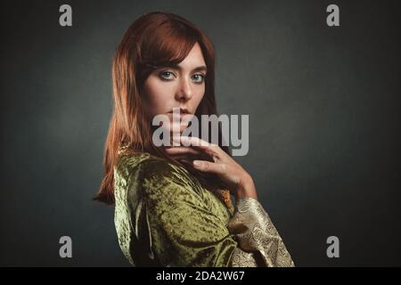 Beautiful red haired woman. Studio portrait Stock Photo