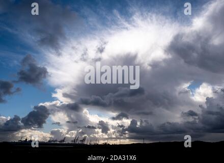 Storm and rain clouds looking out on the Irish Sea from the Liverpool and Sefton beach and coastline. Stock Photo