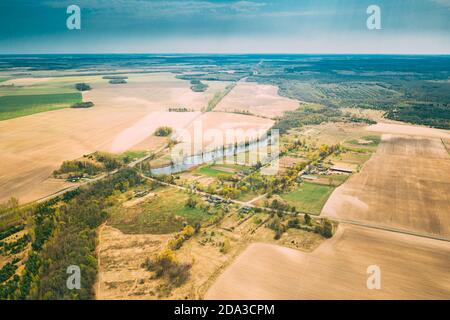 Vasilyovka, Dobrush District, Gomel Region, Belarus. Aerial View Of Small Village With Wooden Houses At Spring Day. Beautiful Rural Landscape In Bird Stock Photo