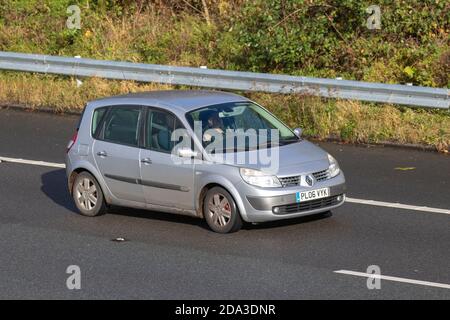 2006 silver Renault Scenic Dynamique VVT; Vehicular traffic, moving vehicles, cars, vehicle driving on UK roads, motors, motoring on the M6 motorway highway UK road network. Stock Photo