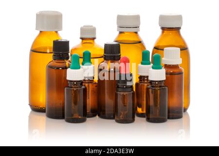 Set collection row of various brown medicine bottles without labels, isolated on white  background Stock Photo