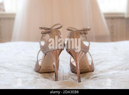 Jimmy Choo white wedding shoes for a bride Stock Photo - Alamy