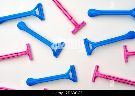 Pink and blue razors on white background Stock Photo
