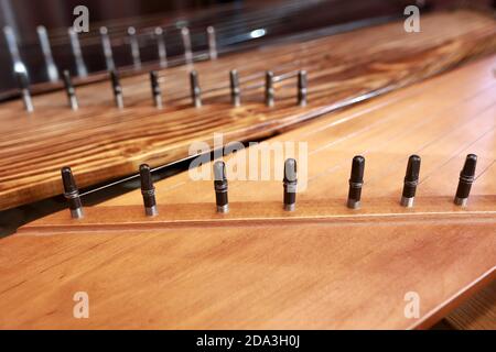 Details of ancient Russian instruments of harp on table Stock Photo