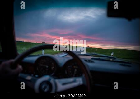 Classic Alfa Romeo GT Junior on Country Road. Drivers View Stock Photo