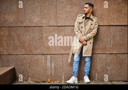 Stylish kuwaiti man at trench coat. Stock Photo