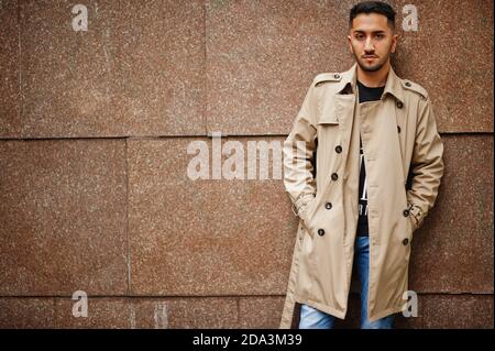 Stylish kuwaiti man at trench coat. Stock Photo