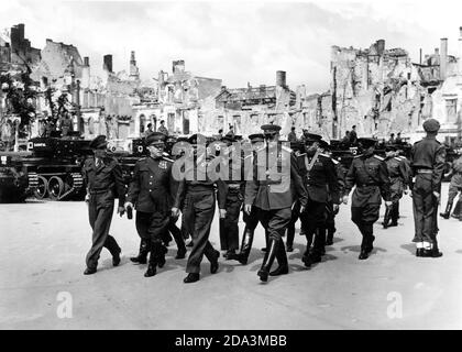 Field Marshall Montgomery: In the centre (from left):the conquerors of Berlin General Georgy Zhukov (with sash), the British General Bernard Montgomery and the Soviet General Konstantin Rokossovsky during the Victory Parade in Berlin 1945. Stock Photo