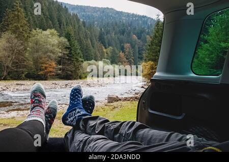 Man and woman legs in warm socks Stock Photo