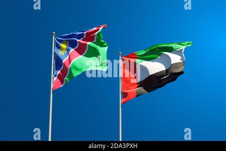 Namibia and United Arab Emirates, UAE flag waving together in the wind ...