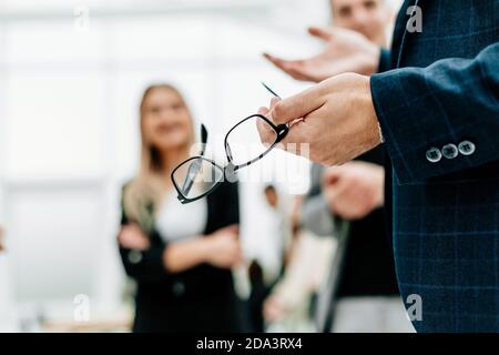 close up. business man explaining something to his colleagues Stock Photo