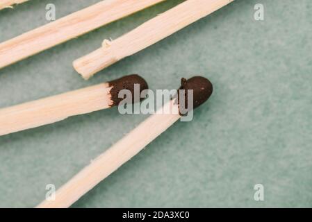 Close-up matches. Wooden sticks for lighting fire. Flat background, top view Stock Photo