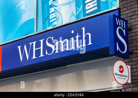 Shop logo for the high street newsagent and bookstore WH Smith, Glasgow, Scotland, UK Stock Photo