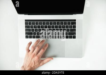 top view. casual man using the touchpad . Stock Photo