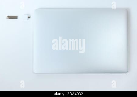close up. laptop and flash card on a white background . Stock Photo
