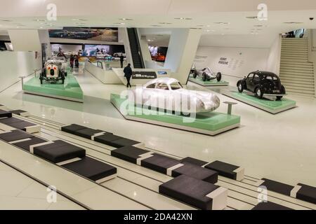 Stuttgart, Germany – January 24, 2018. Interior view of Porsche Museum in Stuttgart. View with cars and people. Stock Photo