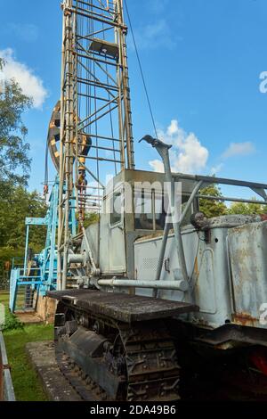 Wietze, Germany, September 10., 2020: Tracked drilling rig with mounted drilling tower for exploratory drilling Stock Photo
