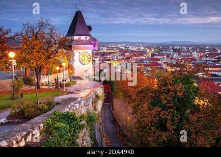 Graz, Austria. Cityscape image of the Graz, Austria with the Clock Tower at beautiful autumn sunset. Stock Photo