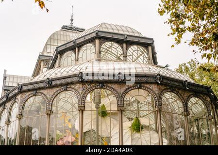 Madrid, Spain - October 24, 2020: Palacio de Cristal or Glass Palace in Buen Retiro Park during Autumn. Stock Photo