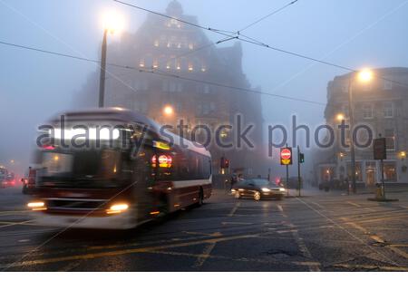 Edinburgh, Scotland, UK. 9th Nov 2020. Thick Afternoon fog persists in the city centre, cars and buses seen here at the Caledonian hotel in the West End and Princes Street.  Credit: Craig Brown/Alamy Live News Stock Photo