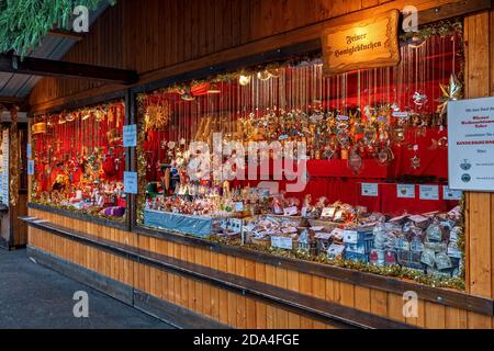 Wooden kiosks on selling gifts and handmade souvenirs during famous traditional Christmas market taking place in Vienna, Austria. Stock Photo