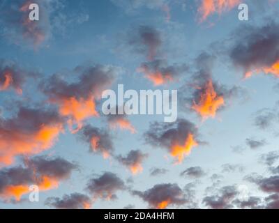 Fire-red sky in the evening clouds Stock Photo