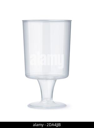 Front view of clear stemmed disposable sampling plastic shot glass isolated on white Stock Photo