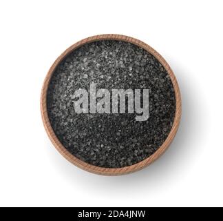 Top view of black salt in wooden bowl isolated on white Stock Photo