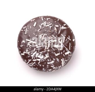 Top view of chocolate cookie with coconut shavings isolated on white Stock Photo