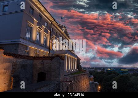 The government house. Evening top view of night Tallinn, Estonia. Dramatic purple clouds in the sky Stock Photo