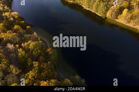 Berlin, Germany. 05th Nov, 2020. The trees at Grunewaldsee glow in autumn (photo taken with a drone). Credit: Paul Zinken/dpa-Zentralbild/ZB/dpa/Alamy Live News Stock Photo