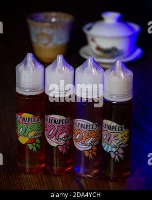 Ufa, Russia, Vape Shop, 1 July, 2019: E-liquid e-juice High vape for  electronic cigarette vaping device , on counter in smoke vapor in vape bar  in bot Stock Photo - Alamy