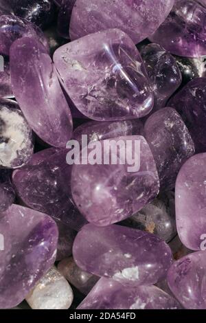 tumbled Amethyst  gem stone as mineral rock specimen Stock Photo