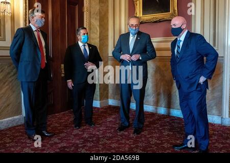 Sen. Ben Ray Lujan (D-N.M.) speaks with reporters as he departs a vote ...