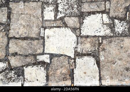 Stone pavement broken near construction Stock Photo
