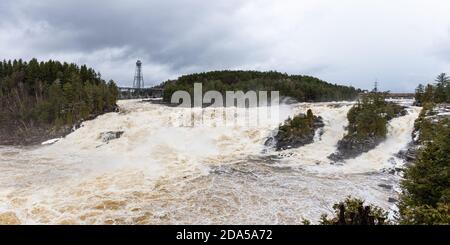 The Saint-Maurice river at the Shawinigan devil's hole during the spring floods, Quebec, Canada. Stock Photo