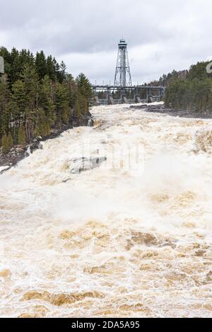 The Saint-Maurice river at the Shawinigan devil's hole during the spring floods, Quebec, Canada. Stock Photo