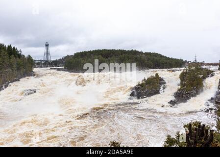 The Saint-Maurice river at the Shawinigan devil's hole during the spring floods, Quebec, Canada. Stock Photo