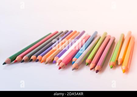 Color Pencils of Various colors placed on white background Stock Photo