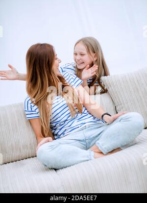 guess who. mom plays with her daughter Stock Photo