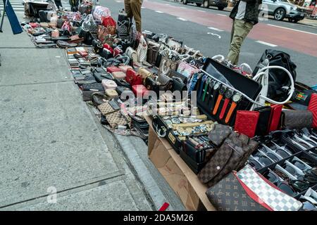 Selling imitation luxury goods on Canal Street, New York City