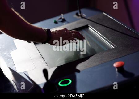 Operator working with HMI (Human Machine Interface) touch screen panel. Selective focus. Stock Photo