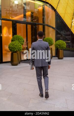 Full length rear view shot of businessman walking Stock Photo