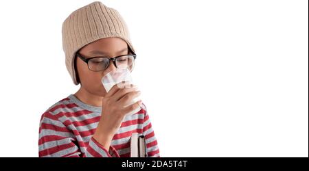 Boy in glasses drinking milk isolated on a white background Stock Photo